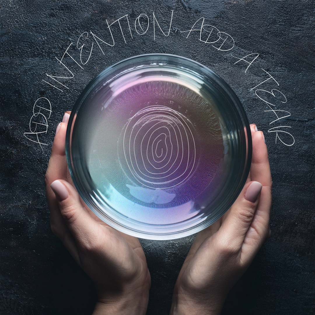 Hands holding a bowl of Water