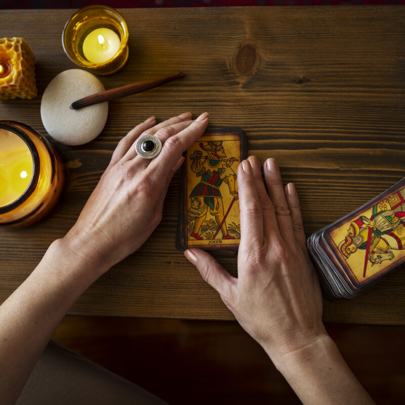 Top view woman reading tarot