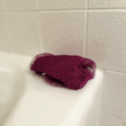 African Net Sponge - Purple, on tub